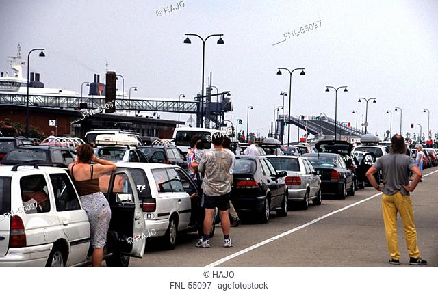 Tourists waiting at port, Travemuende, Germany