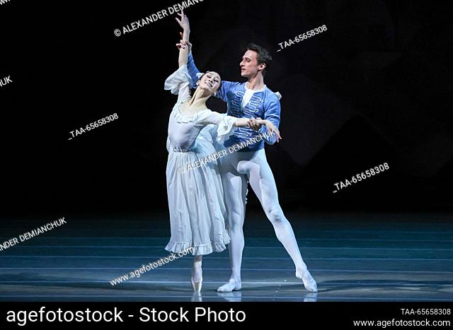 RUSSIA, ST PETERSBURG - DECEMBER 11, 2023: Mariinsky Ballet first soloists May Nagahisa as Princess Masha and Philipp Stepin as the Nutcracker Prince perform in...