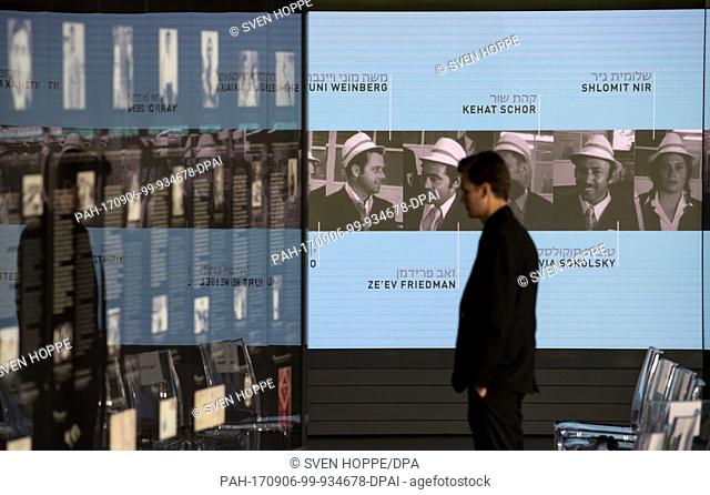 A man looks at information displays at the newly unveiled memorial in honour of the victims of the 1972 Munich Summer Olympics massacre in Munich, Germany