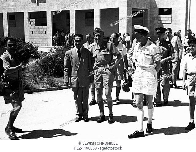 Count Folke Bernadotte (1895-1948) with UN men in the hall of the National Institutions. Count Folke Bernadotte was noted for his negotiation for the release of...