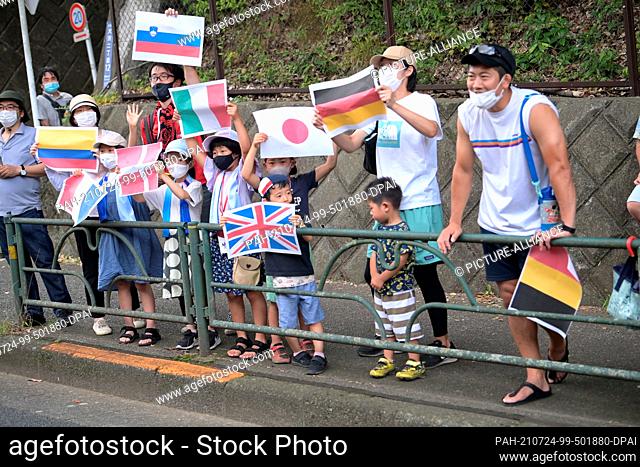 24 July 2021, Japan, Tokio: Cycling: Olympics, Tokyo - Oyama (234.00km), Men, Road Race. Fans are waiting for the cyclists