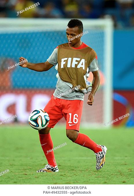 Julian Green of USA warms up before the FIFA World Cup 2014 group G preliminary round match between Ghana and the USA at the Estadio Arena das Dunas Stadium in...