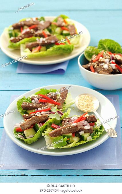 Beef, cucumber and coriander in romaine lettuce boats