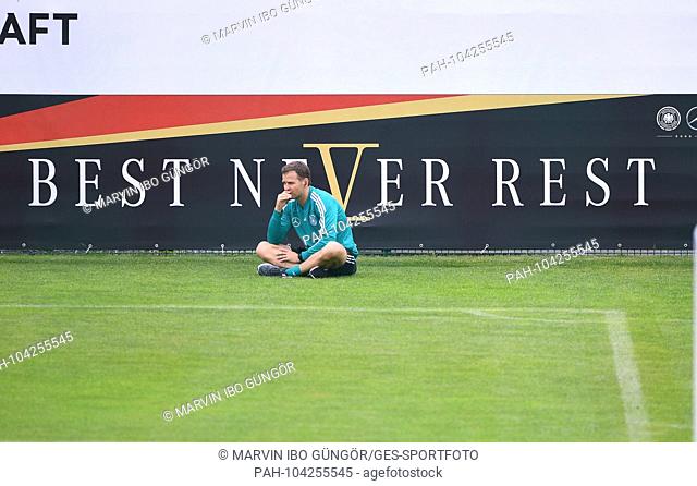 Oliver Bierhoff (Germany / Manager national team) is sitting thoughtfully on the pitch. GES / Football / Preparing for the 2018 World Cup: Training of the...