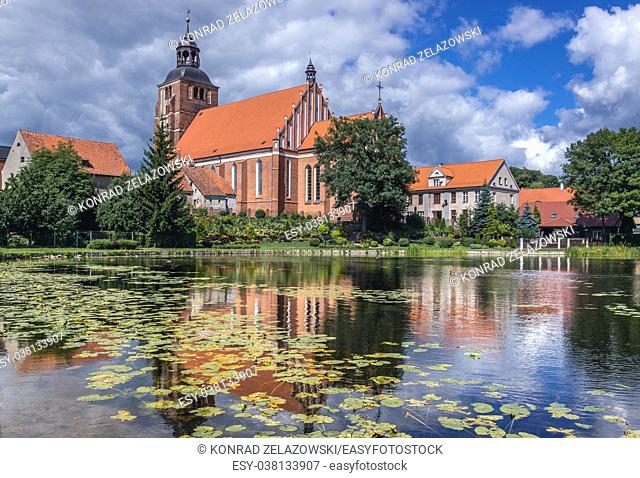 Gothic Church of Saint Anne and Saint Stephen over so called Prison Pond on Pisa River in Barczewo town, Warmian-Masurian Voivodeship of Poland