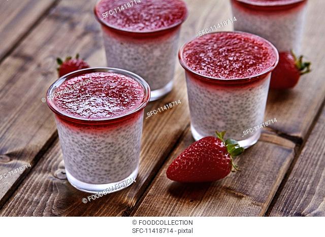 Coconut pudding with chia seeds and strawberry sauce