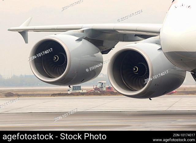 Airbus A380 airplane's engines on a runway at an airport