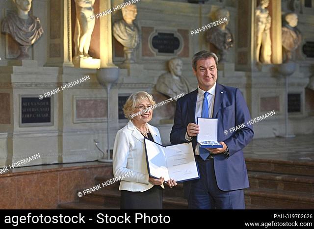 Brigitte HOELLER receives the Bavarian Order of Merit from Markus SOEDER (Prime Minister of Bavaria and CSU Chairman). Awarding of the Bavarian Order of Merit...