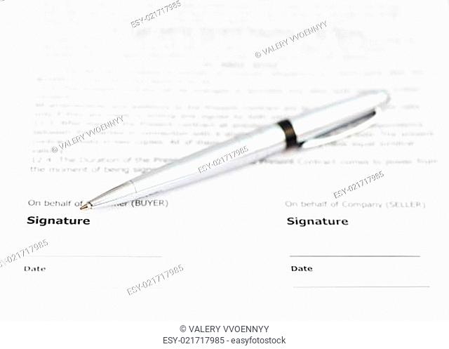 silver pen on signature page of contract