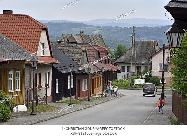Jozefa Pilsudskiego street, village of Lanckorona, renowned for its well preserved 19th century wooden houses, Malopolska Province (Lesser Poland), Poland