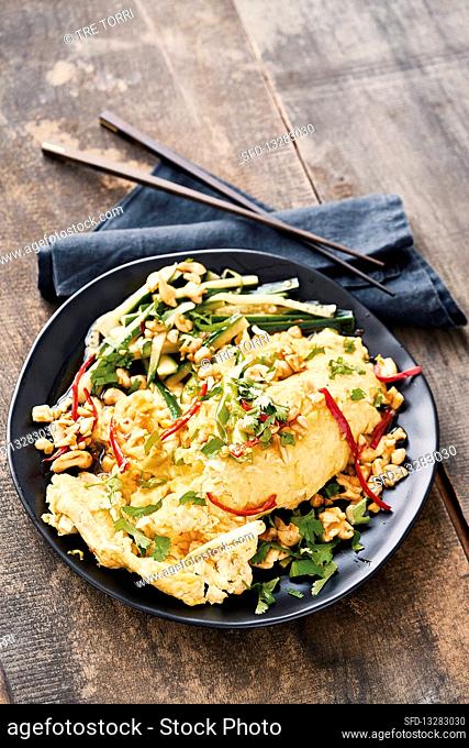 Oriental-style scrambled eggs with cucumber, chilli, spring onions and ginger