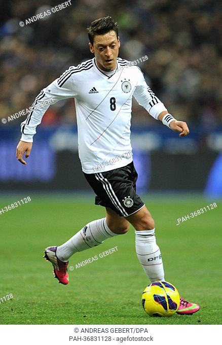 Germany's Mesut Oezil controls the ball during the international friendly soccer match France vs. Germany at the Stade de France in Paris, France
