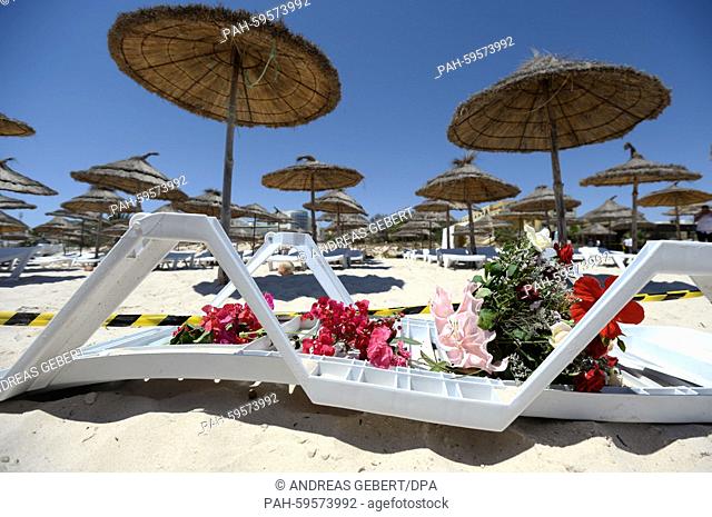 Flowers for the victims on a sun lounger at the Imperial Marhaba Hotel in Sousse, 27 June 2015. At least 39 people were killed in the terror attack in the...