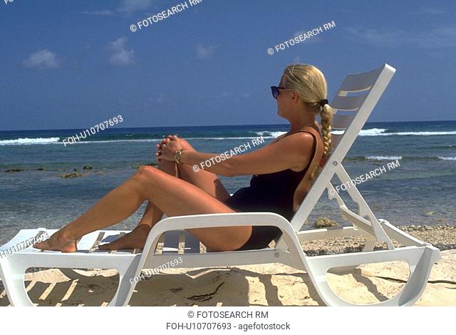 chaise, blonde, sits, female, woman, young