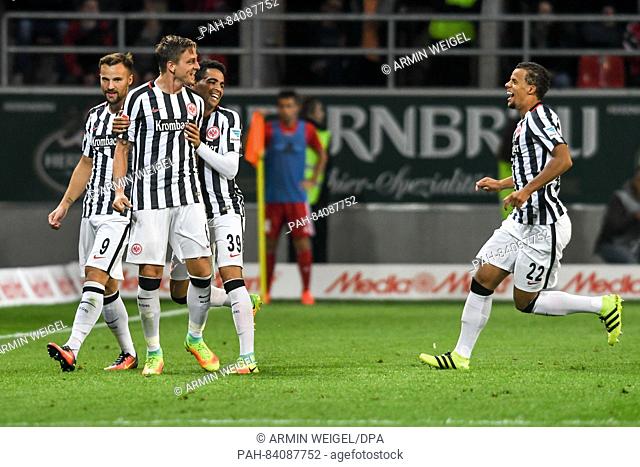 Frankfurt's Bastian Oczipka celebrates his 0-2 goal with Haris Seferovic (L), Omar Mascarell and Timothy Chandler (R) at the German Bundesliga soccer match...