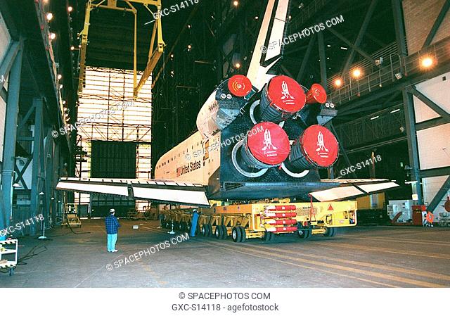 12/02/1999 -- Orbiter Endeavour rolls inside the Vehicle Assembly Building where it will be lifted to vertical and mated to the external tank and solid rocket...