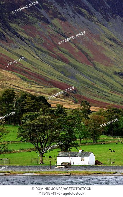 An isolated building on the shore of Buttermere, Lake District, Cumbria, England, Europe