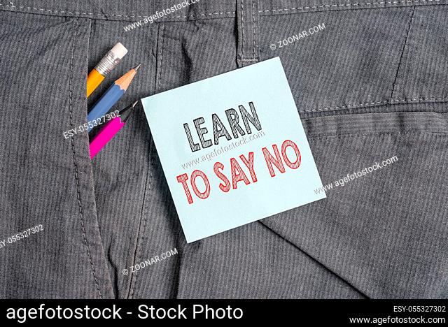Handwriting text Learn To Say No. Conceptual photo decline or refuse few things before you destroy yourself Writing equipment and blue note paper inside pocket...