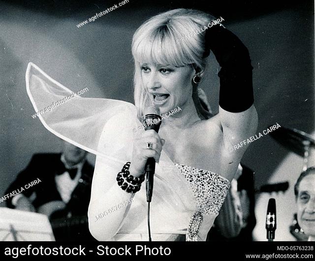 Italian showgirl Raffaella Carrà (Raffaella Maria Roberta Pelloni) singing. 1970s