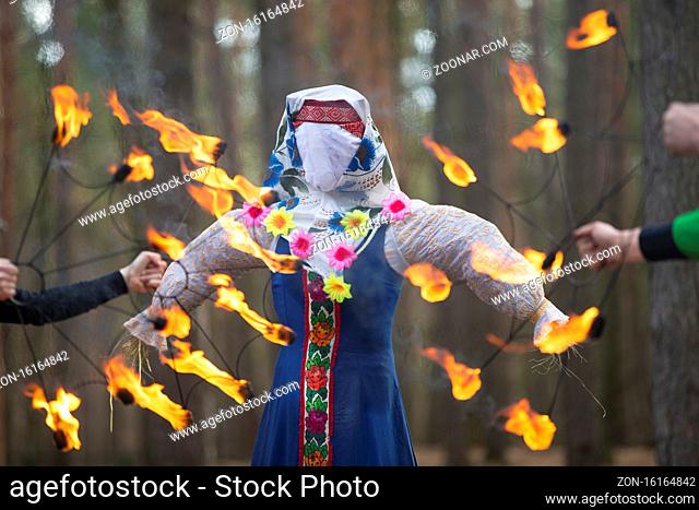 Burning straw stuffed carnival, a symbol of winter and death in Slavic mythology, pagan tradition. Religious and folk festival of the East Slavic people