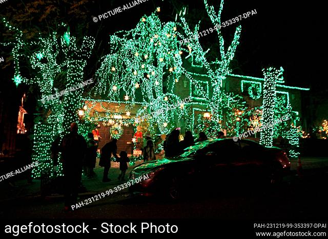 18 December 2023, USA, New York: A house decorated for Christmas in Dyker Heights. As Christmas approaches, it's that time of year again for the otherwise quiet...
