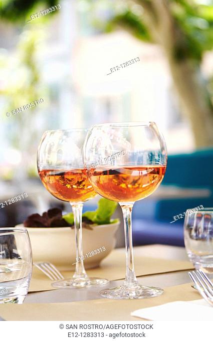 Glasses of rosé (Bandol AOC) on the table of a restaurant, La Cadière-d'Azur, Var, Provence-Alpes-Côte d'Azur, France