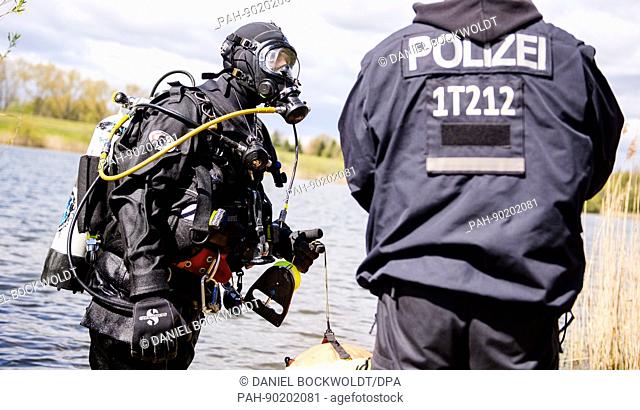 A police diver during training at the Hohendeicher Lake in Hamburg, Germany, 27 April 2017. Police divers from Hamburg and 10 other German federal states...