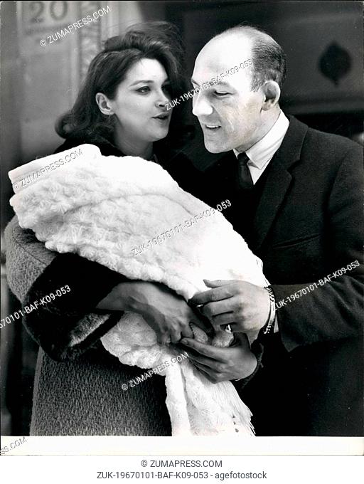 Jan. 01, 1967 - Stirling Moss Collects His Wife And New Baby Daughter From The London Clinic Ex-champion racing driver, Stirling Moss