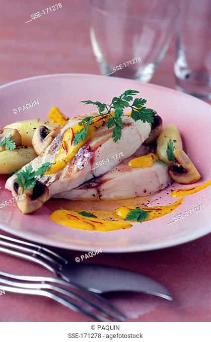 Sea bream fillet with creamy saffron sauce and Ratte potatoes