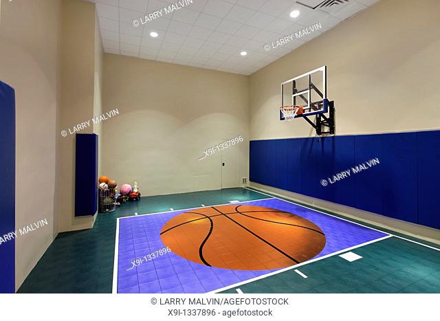 Large indoor basketball court in luxury home