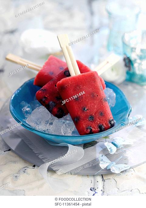 Melon and blueberry ice lollies