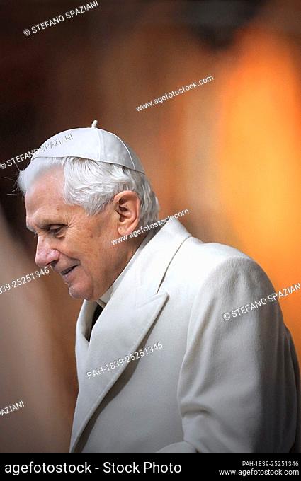 Pope Benedict XVI arrives to pray in front of the nativity in Saint Peter's Square after celebrating the Vespers and Te Deum prayers in Saint Peter's Basilica...