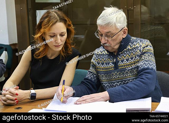 RUSSIA, MOSCOW - DECEMBER 14, 2023: Oleg Orlov (R), co-founder of the Memorial Russian human rights organization (declared a foreign agent in Russia and shut...