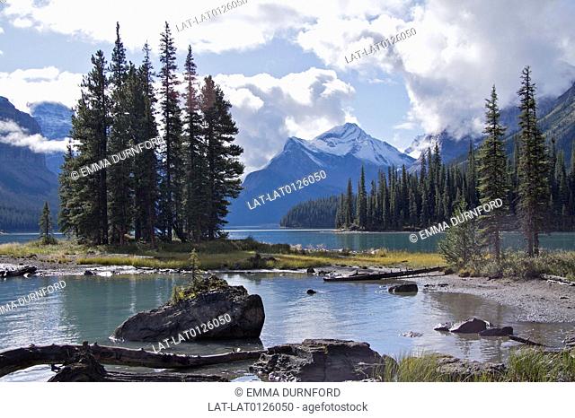The Jasper national park in the Canadian Rockies is a large area of protected landscape including the Maligne river which flows into Medicine lake