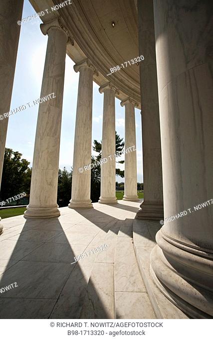 Marble columns create a shadow pattern at the Jefferson Memorial