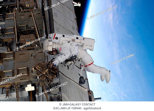 Astronaut Clay Anderson, Expedition 15 flight engineer, participates in the mission's third planned session of extravehicular activity (EVA) as construction and...