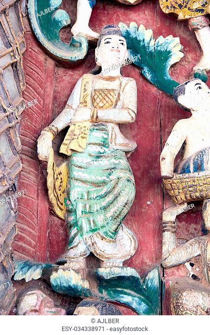 Details of the wooden bas-relief in one small temple at the Shwezigon Pagoda, Nyaung U village, Bagan, Myanmar. Shwezigon Pagoda is a Buddhist temple ubicated...