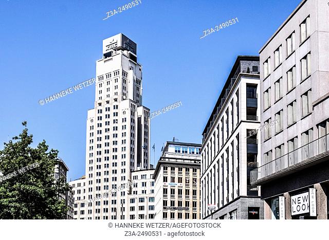 The Boerentoren (English: ""Farmers' Tower""; officially KBC Tower, originally the Torengebouw van Antwerpen) is a tall building in Antwerp, Belgium