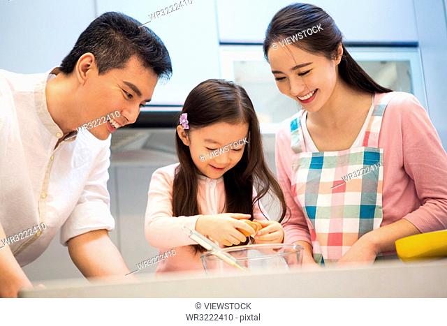 A happy family in the kitchen