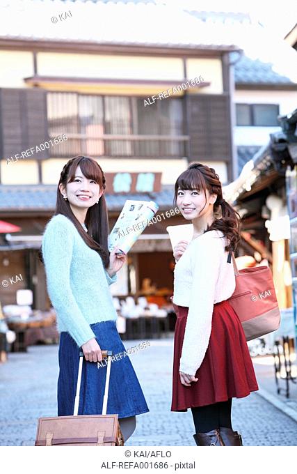 Young Japanese women enjoying trip in Kawagoe, Japan