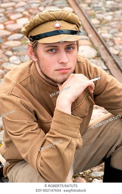 Retro style picture with resting soldier