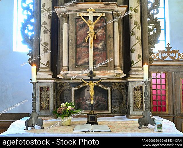 17 September 2020, Brandenburg, Illmersdorf: The altar of the small village church. The small half-timbered church in Illmersdorf holds a special treasure: a...