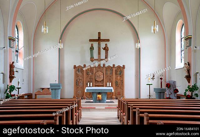 SCHMALLENBERG, GERMANY - JUNE 11, 2020: View throught the main aisle of the parish church Saint Michael on June 11, 2020 in Schmallenberg, Germany