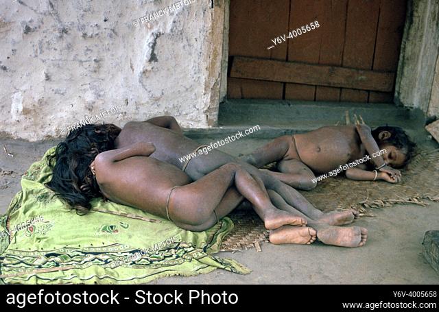 Tribal girls are sleeping on the ground ( Odisha, India)