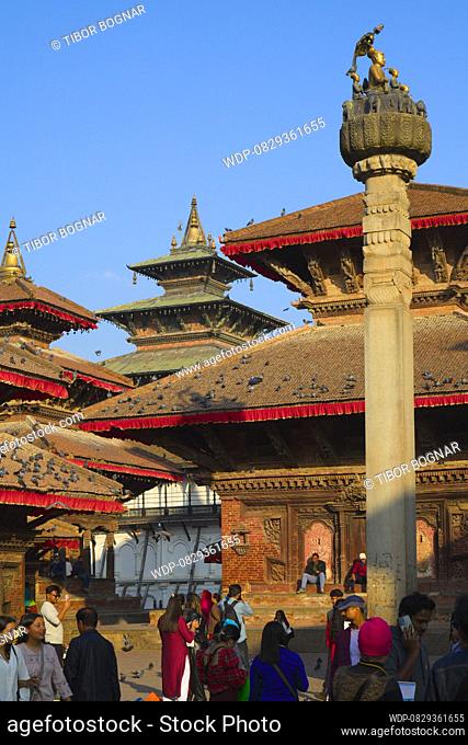 Nepal, Kathmandu, Durbar Square, King Pratap Malla statue, temples, , Credit:Tibor Bognar / Avalon