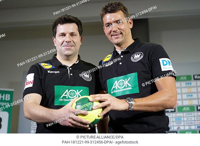 21 December 2018, Berlin: Alexander Haase (l), co-trainer, and Christian Prokop, national coach, at a press conference. The World Handball Championship will...