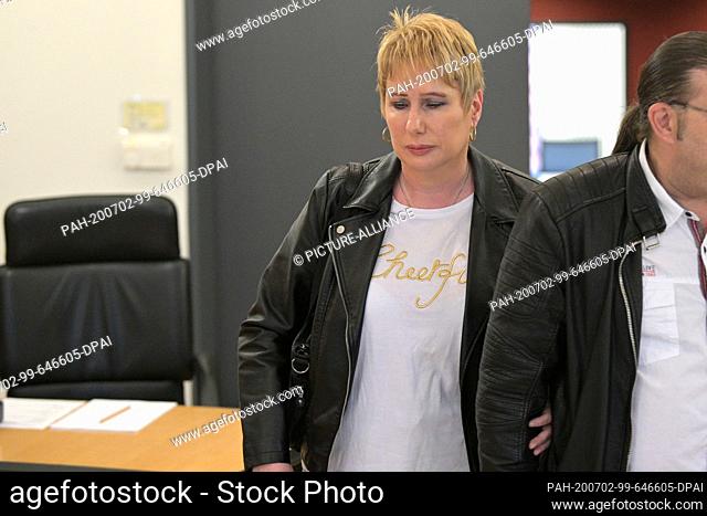 02 July 2020, Bremen: The blind singer Corinna May is on her way to a hearing room of the State Court. In the proceedings