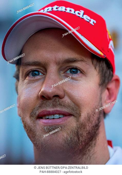 German Formula One pilot Sebastian Vettel of Ferrari speaks to journalists during the testing before the new season of the Formula One at the Circuit de...