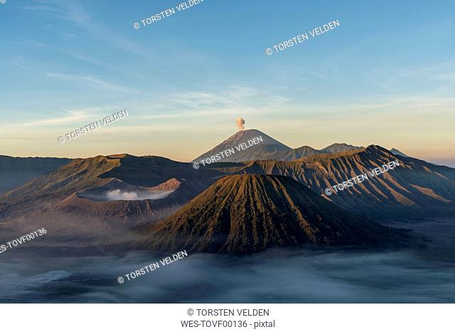 Indonesia, East Java, Aerial view of Mount¶ÿBromo¶ÿshrouded in morning fog