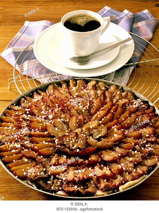 Plum tart and cup of coffee